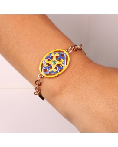 Bracciale in Metallo cristalli bianchi con dettaglio centrale in maiolica a fiore smaltata blu e giallo