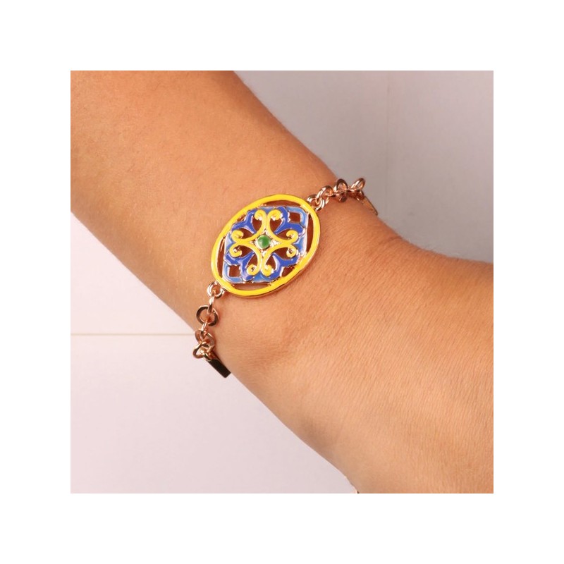 Bracciale in Metallo cristalli bianchi con dettaglio centrale in maiolica a fiore smaltata blu e giallo